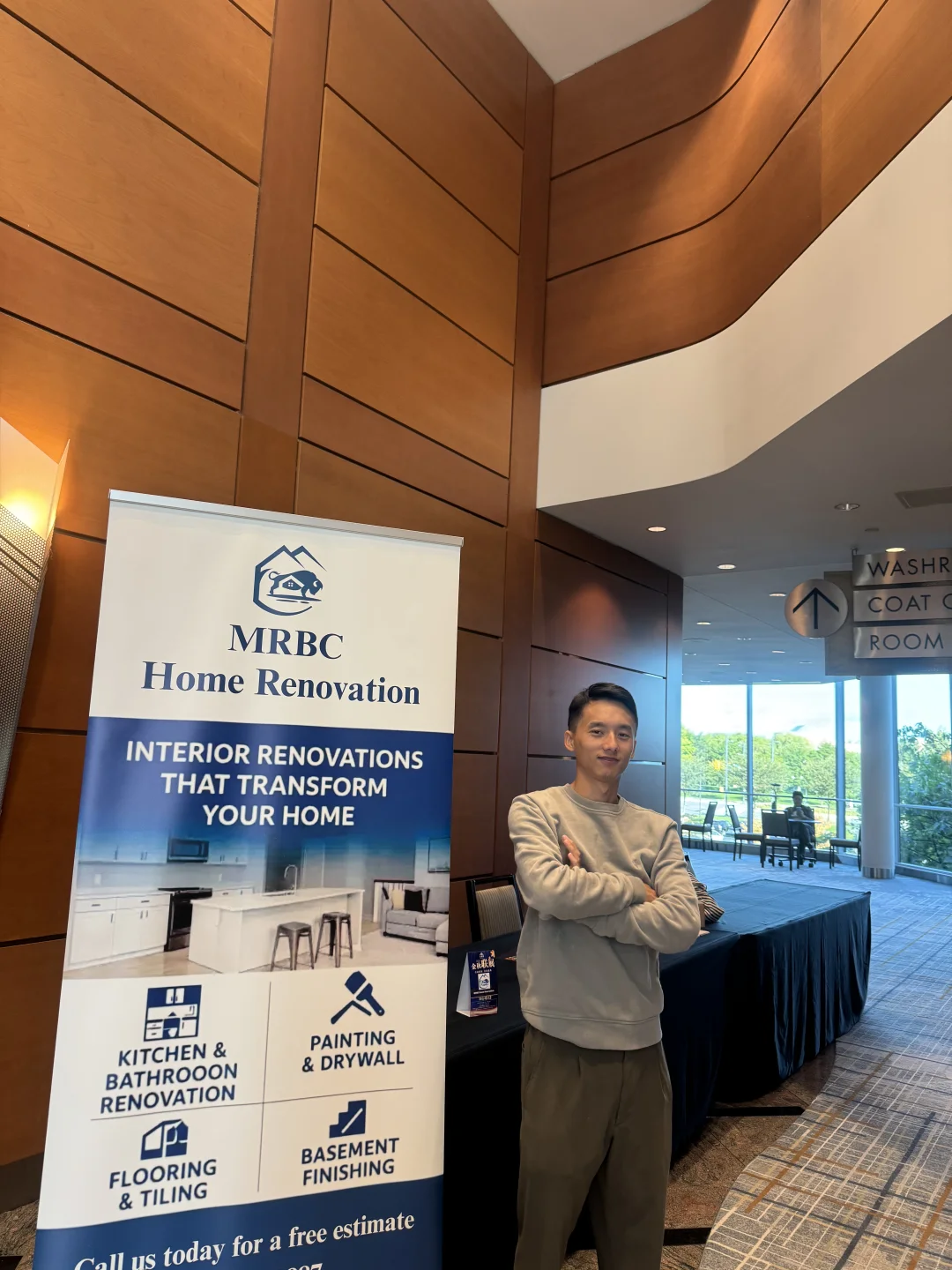 MRB Construction founder beside the company renovation display